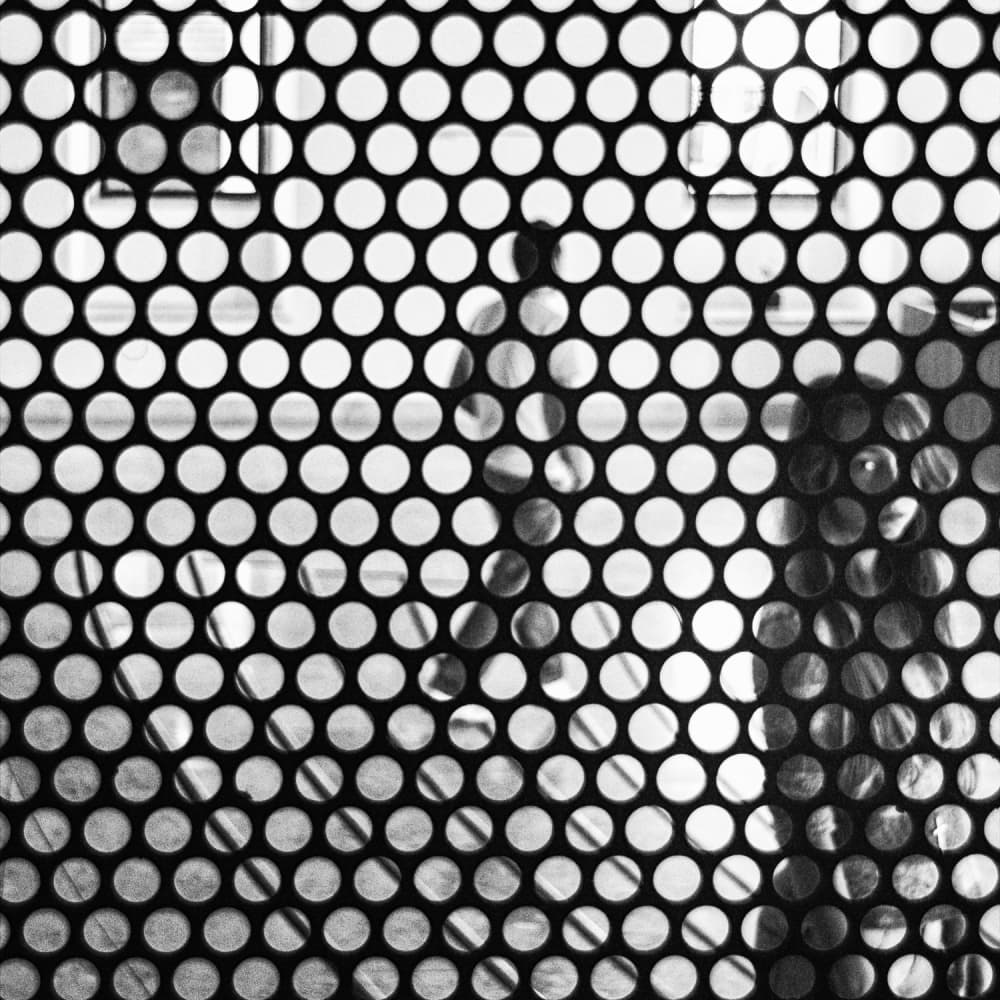 Shadows Through The Grid by Laura Mexia — canvas wall art