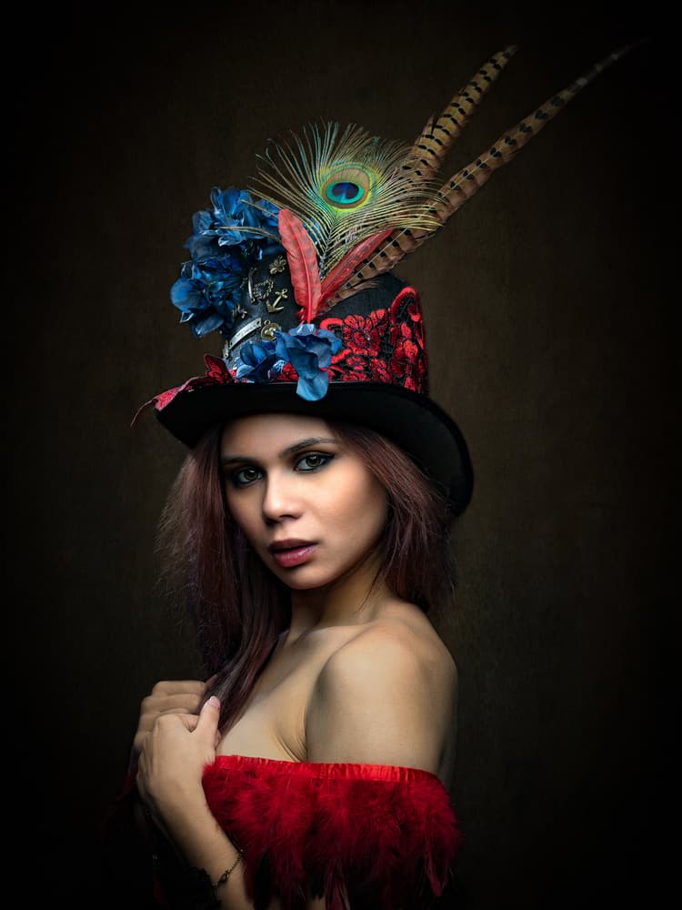 Vibrant Peacock Hat Woman by Luc Stalmans — canvas wall art