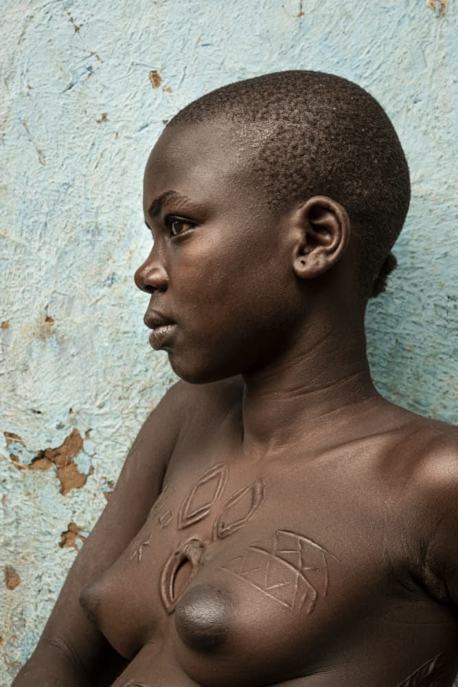 African Scarification Portrait by Elena Molina — canvas wall art
