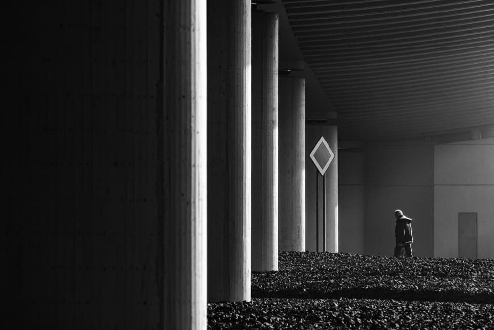 Solitary Figure Under Bridge by Peter Hrabinsky — canvas wall art