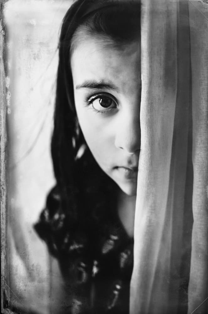 Curious Girl Peeking by Desislava Ignatova — canvas wall art