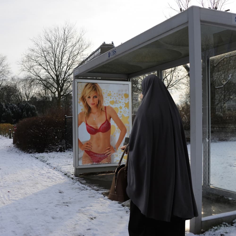 Veiled Woman Snowy Street by Huib Limberg — canvas wall art