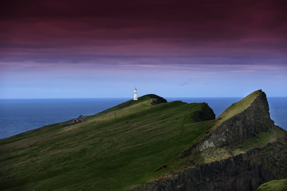 Purple Sky Lighthouse Cliff by Erik Engström — canvas wall art