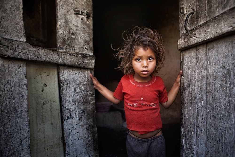 Little Girl In Doorway by Hesham Alhumaid — canvas wall art