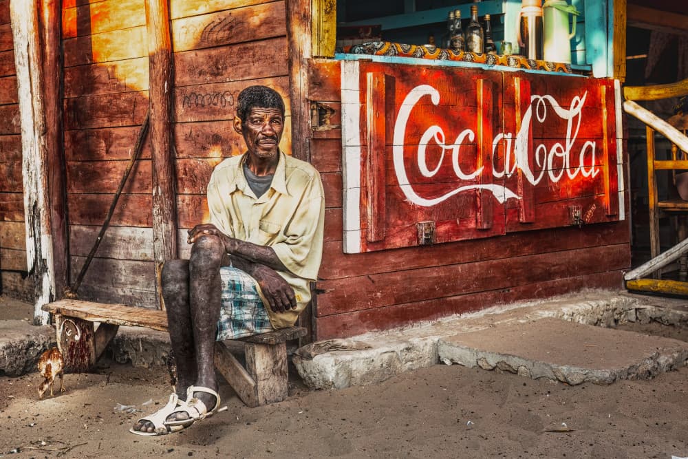 Smiling Man Village Shop by Marco Tagliarino — canvas wall art