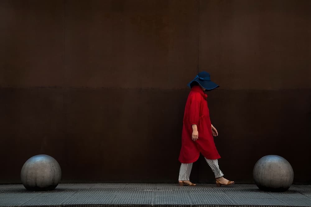 Red Coat Urban Walk by Francesco Martinelli — canvas wall art