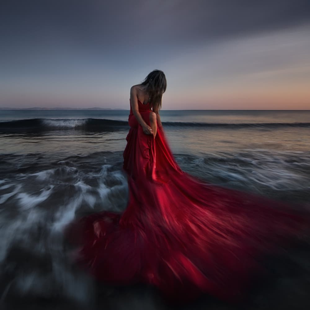 Red Dress on Twilight Shore by Maria Kaimaki — canvas wall art