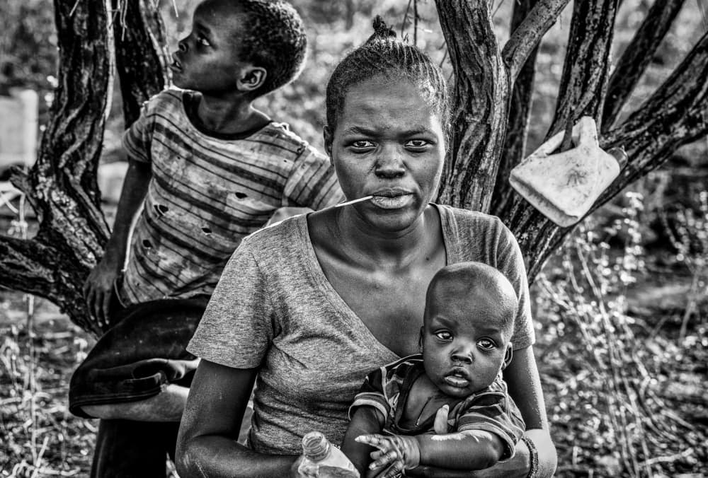 African Motherhood Portrait by Joxe Inazio Kuesta Garmendia — canvas wall art