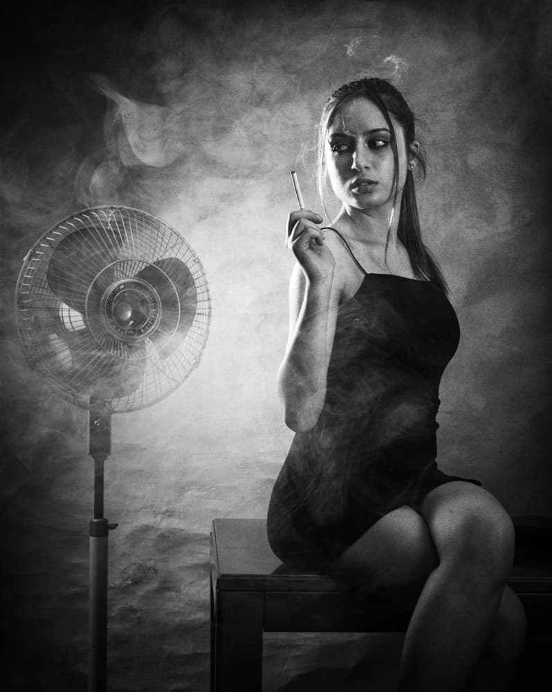 Pensive Woman and Smoke by Aglioni Simone — canvas wall art