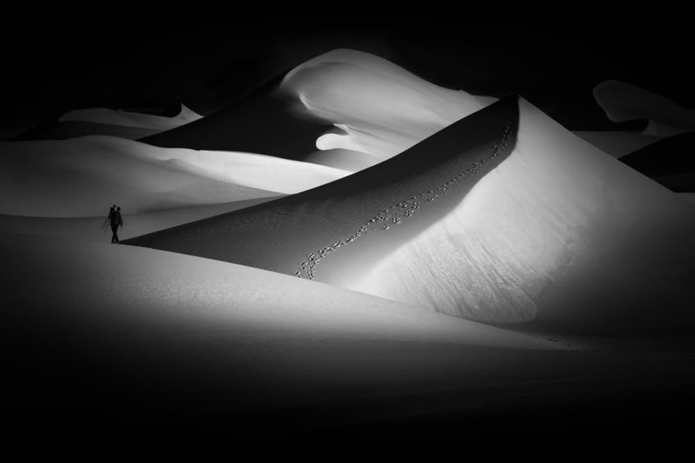 Lone Figure Desert Dunes by Alexandr Kukrinov — canvas wall art