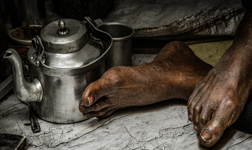Rustic Teapot and Feet by Linda Wride — canvas wall art