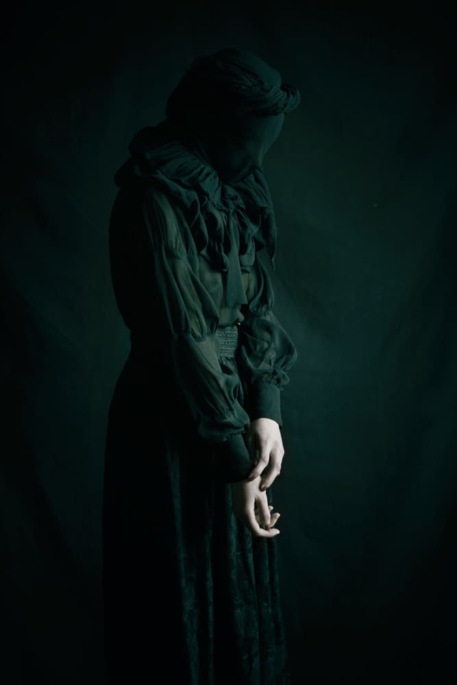 Somber Veiled Woman by Magdalena Russocka — canvas wall art