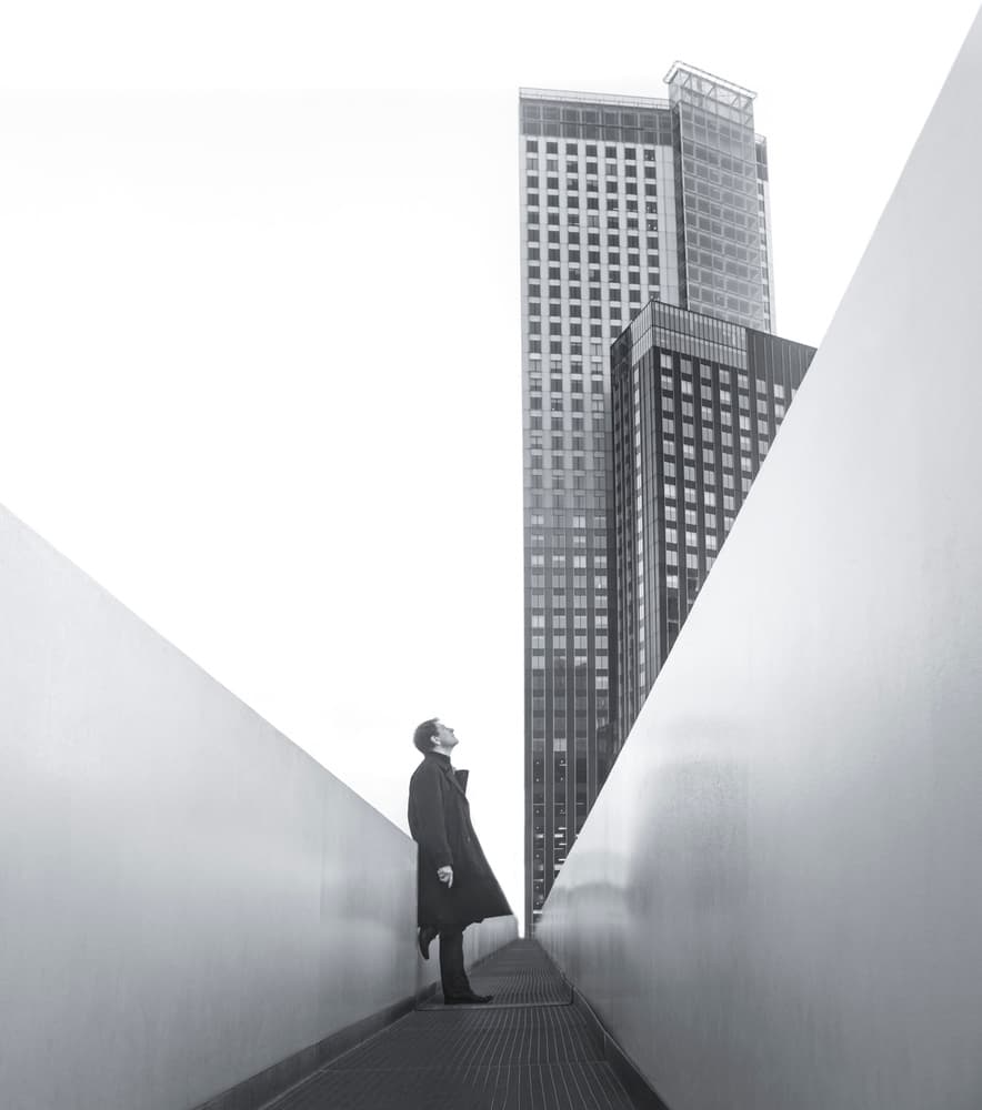 Man Among Skyscrapers by Roelof de Hoog — canvas wall art