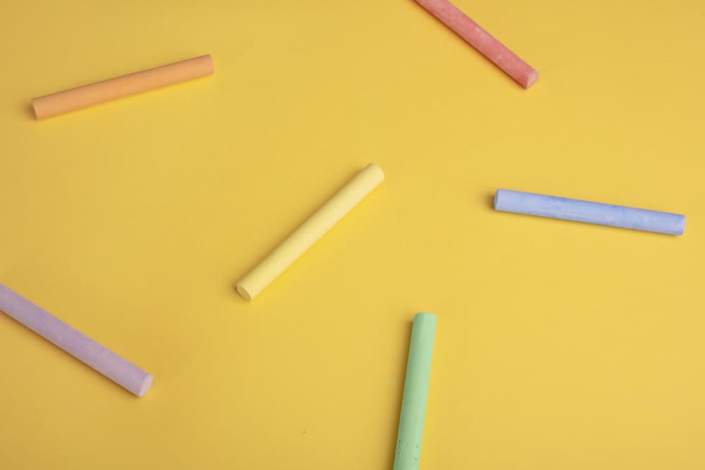 Scattered Colorful Chalk by Julia Ramiro — canvas wall art