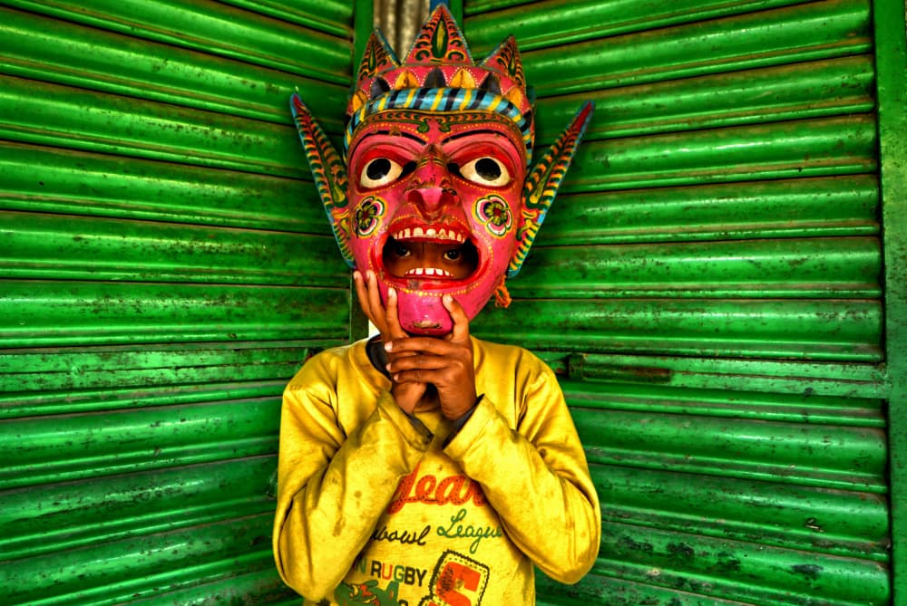 Vibrant Masked Child by Avishek Das — canvas wall art