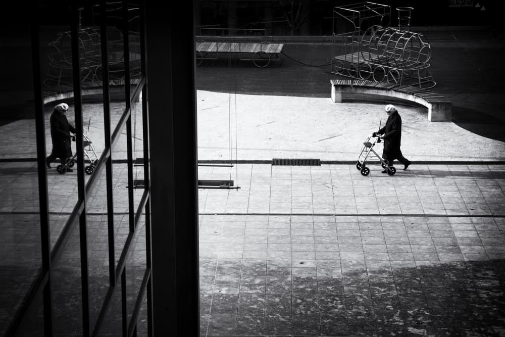 City Walker Reflection by Jurij Bizjak — canvas wall art