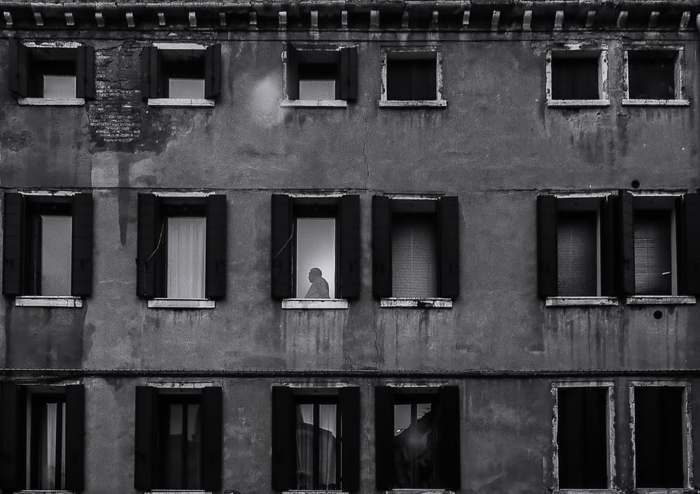 Solitary Figure in Window by Ömer Ates Kızıltug — canvas wall art