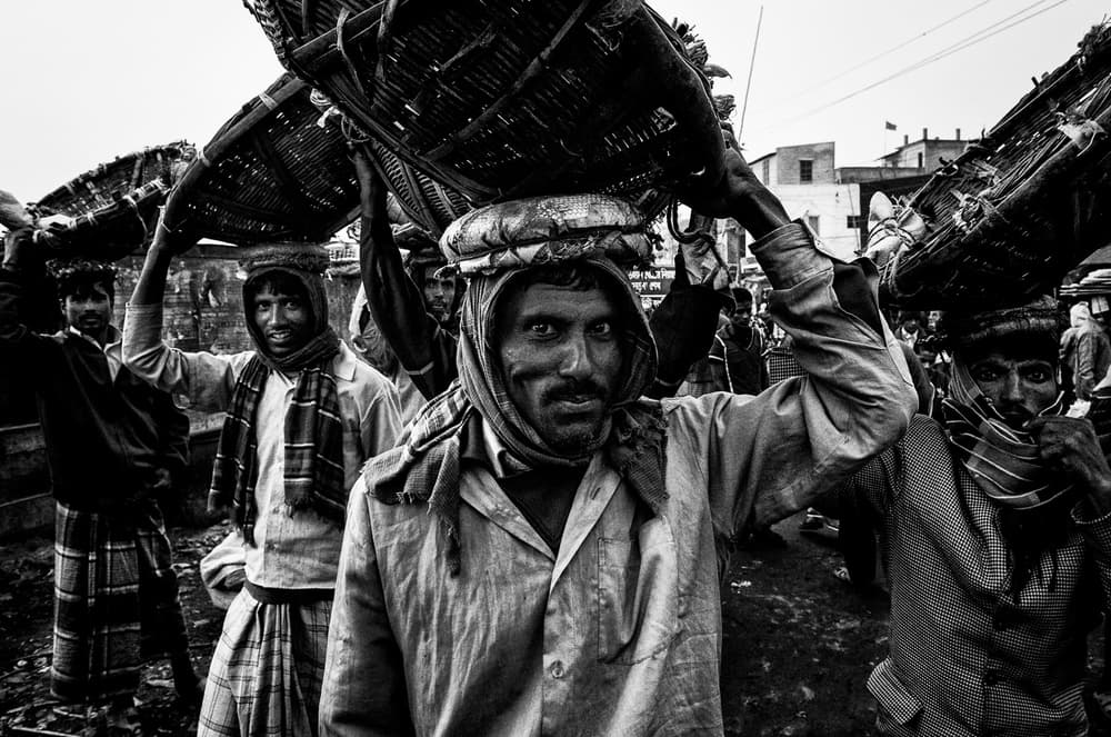 Street Market Laborers by Joxe Inazio Kuesta Garmendia — canvas wall art
