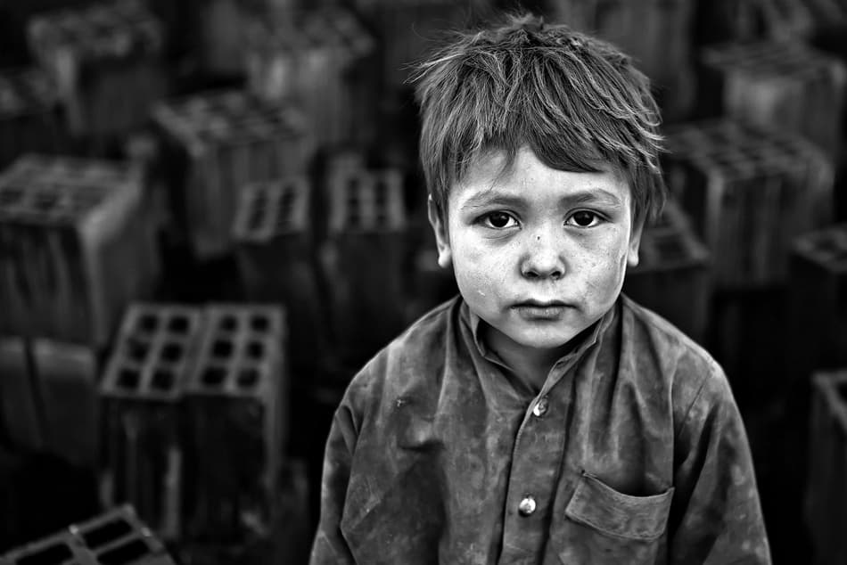 Pensive Boy Portrait by Mohammadreza Momeni — canvas wall art