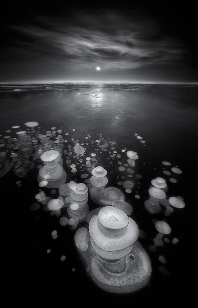 Moonlit Ice Bubbles by Larry Deng APA — canvas wall art