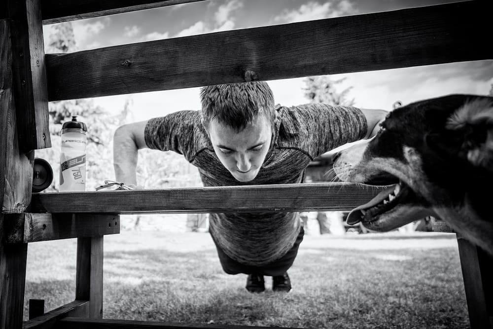 Focused Workout With Dog by Marcel Rebro — canvas wall art