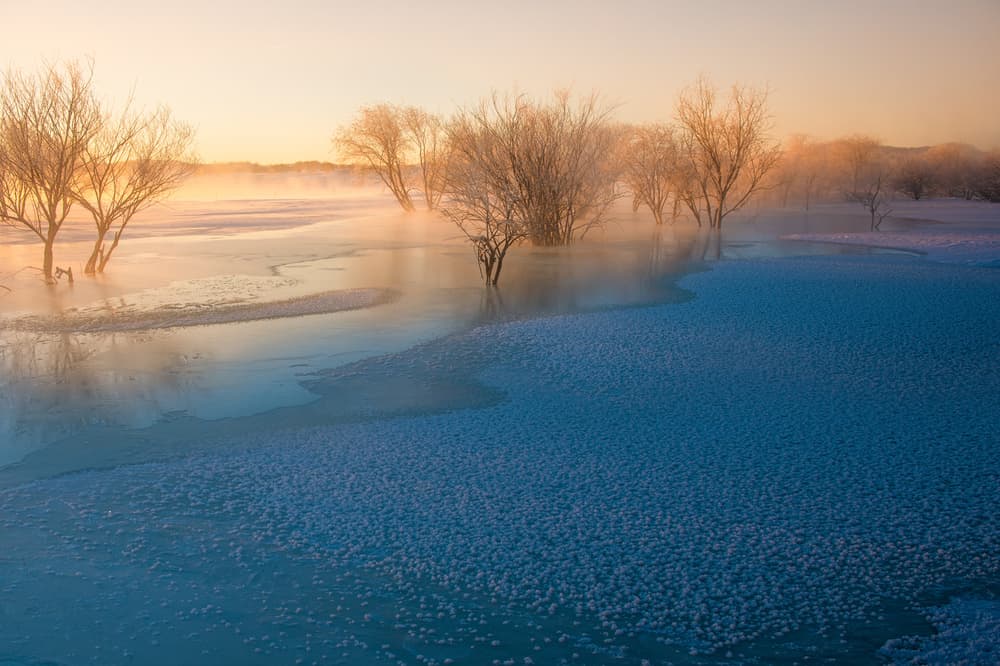 Misty River Sunrise by Simoon — canvas wall art