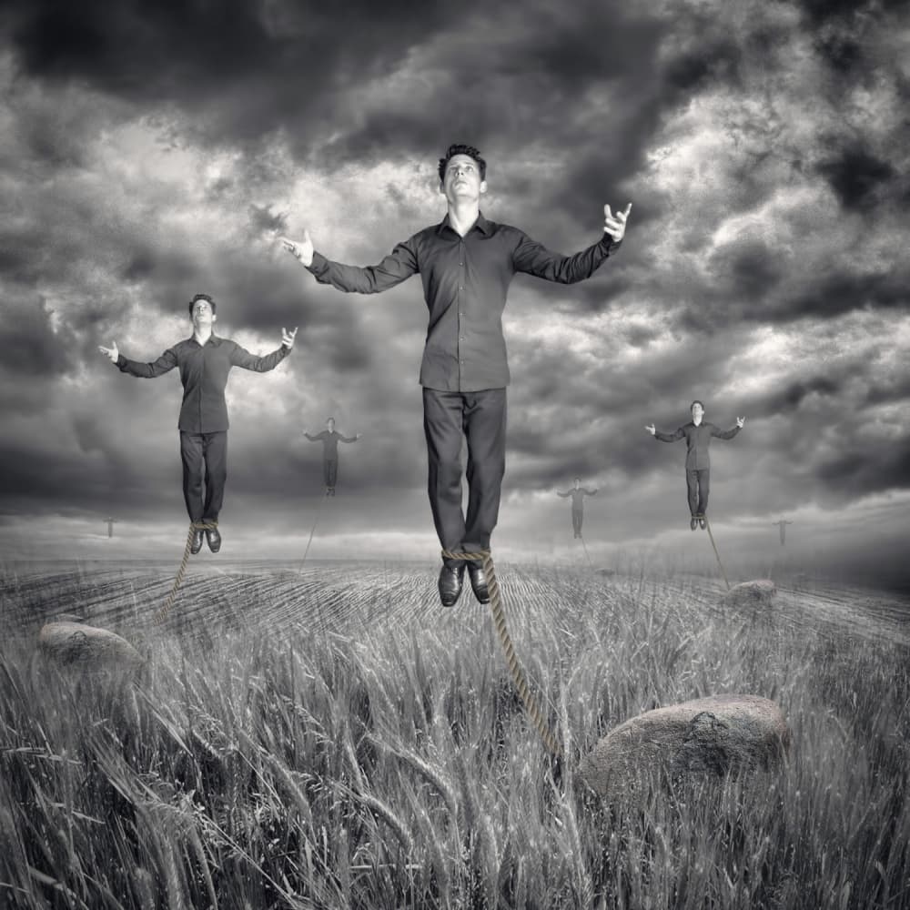Levitating Men Stormy Sky by Baden Bowen — canvas wall art