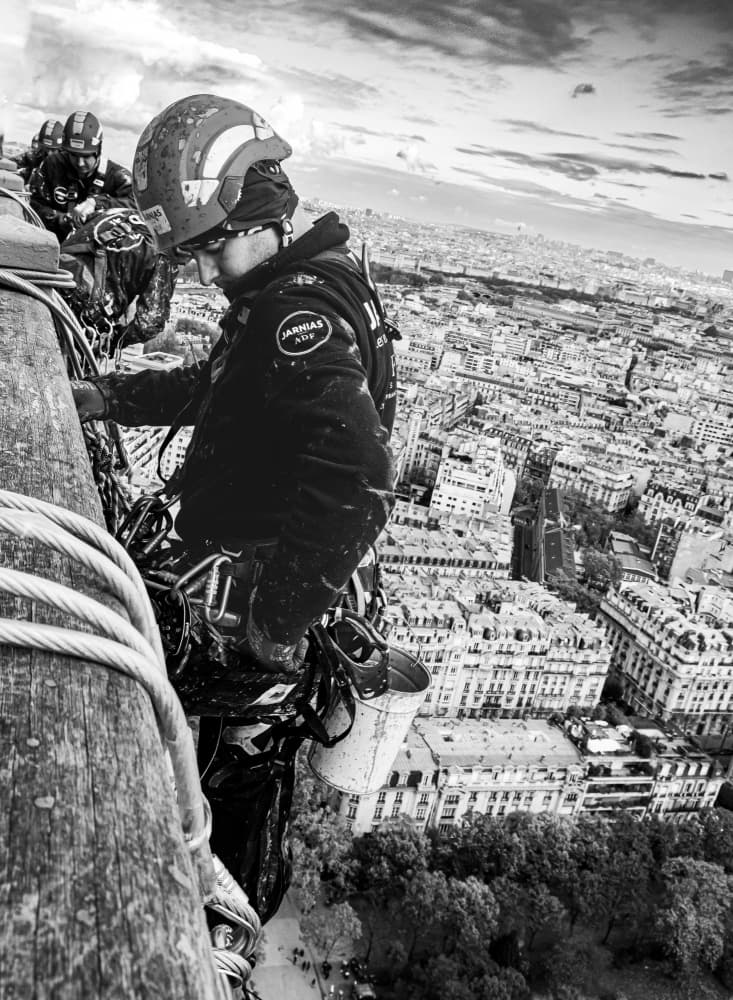 Worker High Above Paris by Andreas Timar — canvas wall art