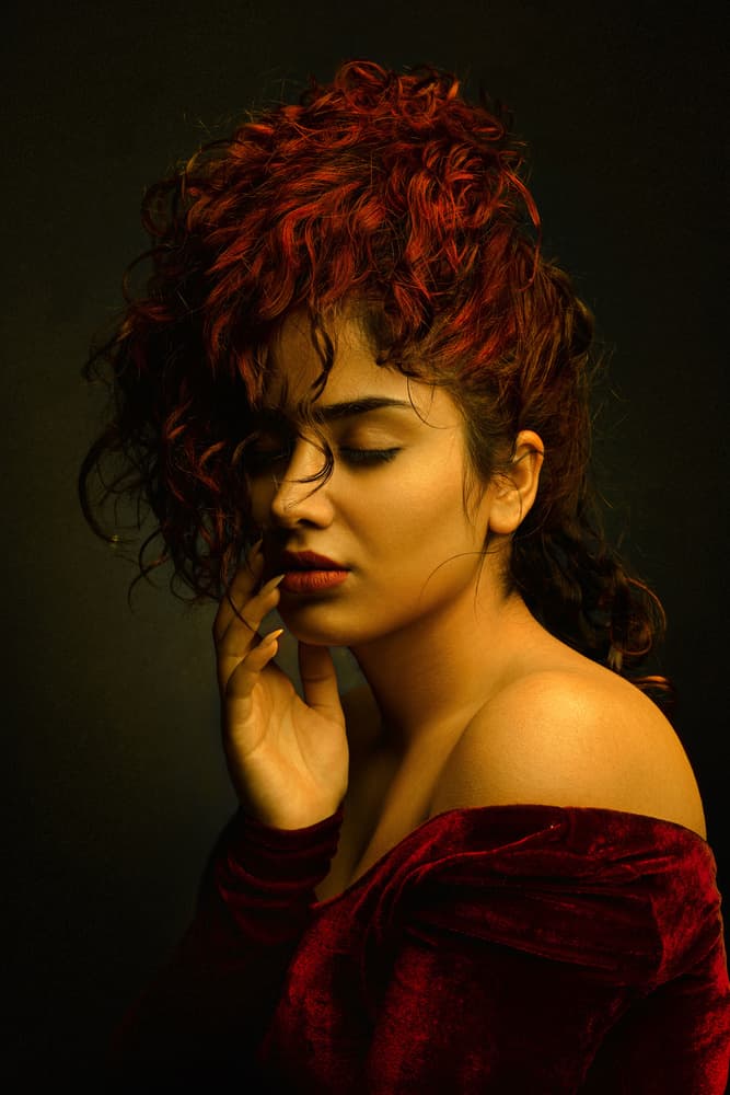 Pensive Woman in Red by Mehdi Mokhtari — canvas wall art