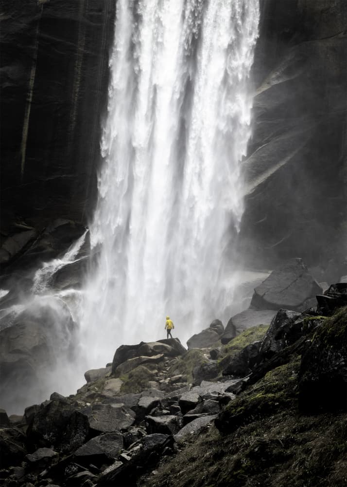 Towering Waterfall Hiker by Christian Lindgren — canvas wall art