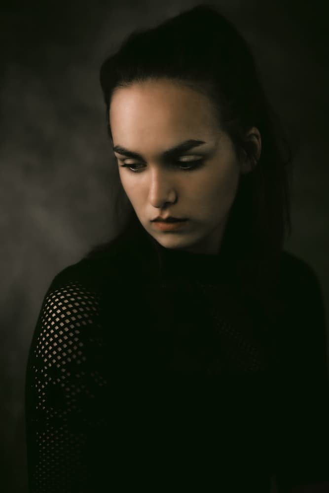 Contemplative Dark Portrait by Jacob Tuinenga — canvas wall art