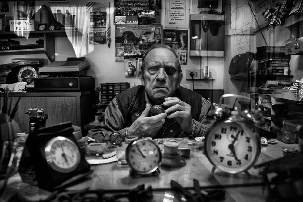 Focused Watchmaker At Work by Antonio Grambone — canvas wall art