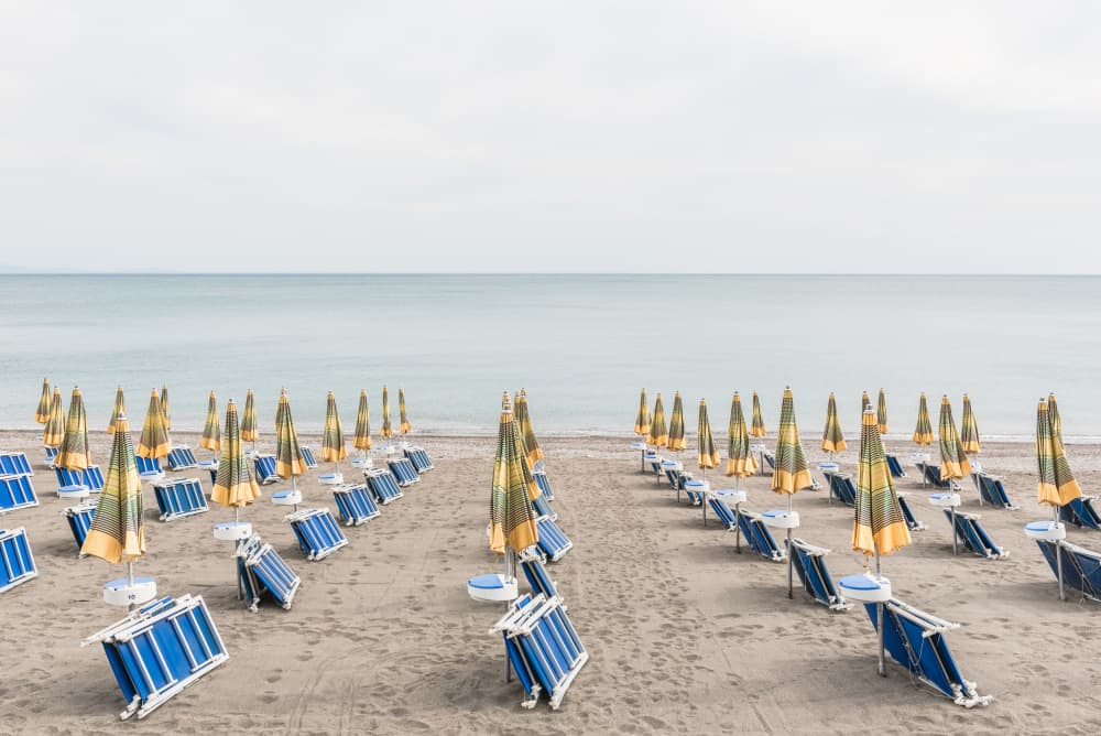 Serene Beach Umbrellas by Photolovers — canvas wall art