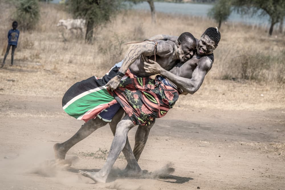 African Wrestling Match by Trevor Cole — canvas wall art