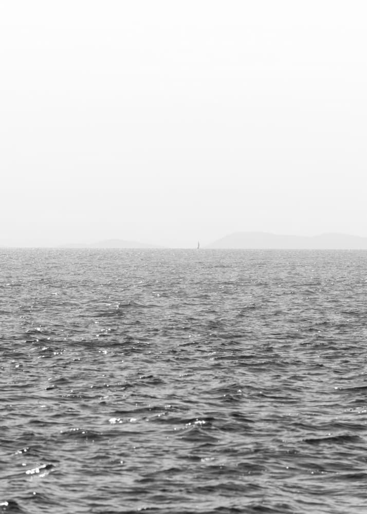 Serene Ocean Sailboat by Lynann Colligan — canvas wall art