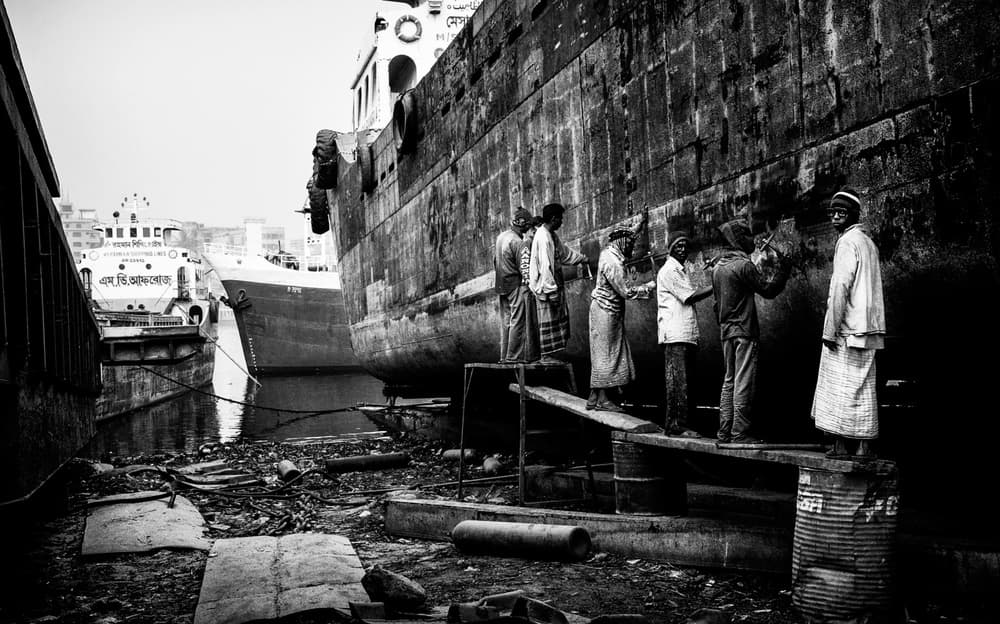 Gritty Shipyard Laborers by Joxe Inazio Kuesta Garmendia — canvas wall art