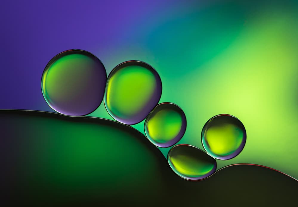 Iridescent Green Orbs by Jacqueline Hammer — canvas wall art