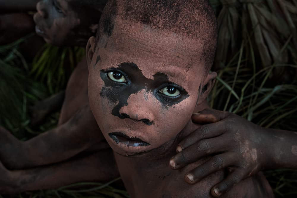 Tribal Child's Intense Gaze by Joxe Inazio Kuesta Garmendia — canvas wall art