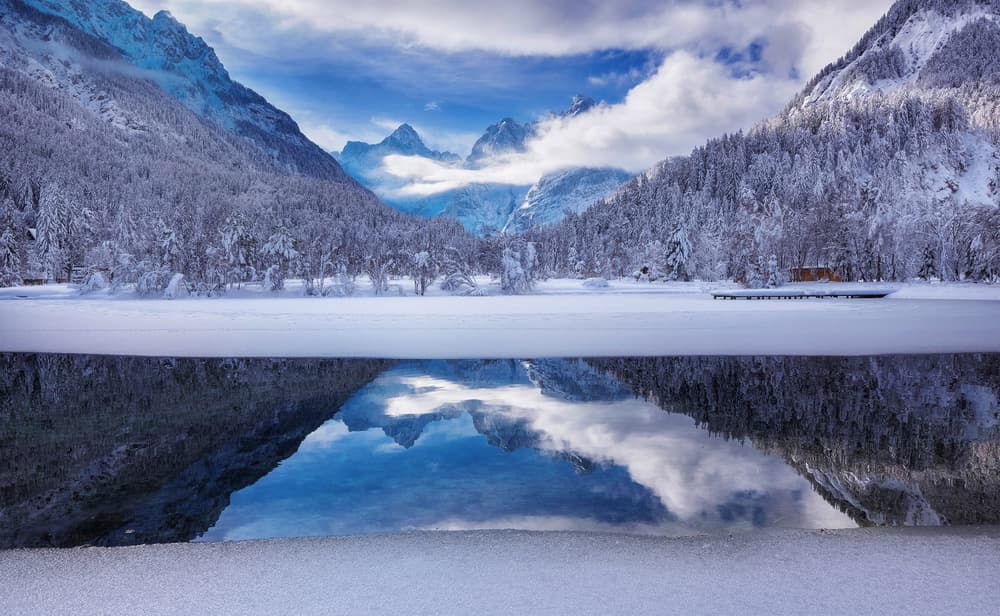 Snowy Mountain Lake Reflection by Ales Krivec — canvas wall art