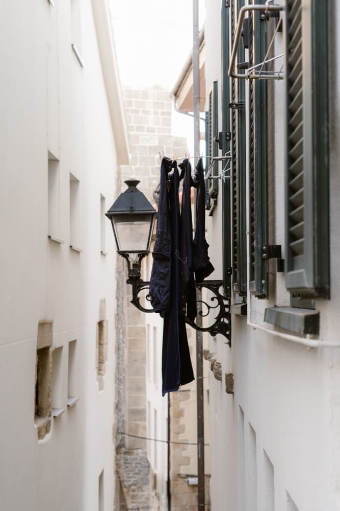 Narrow Alley Laundry by Aimee Giles — canvas wall art