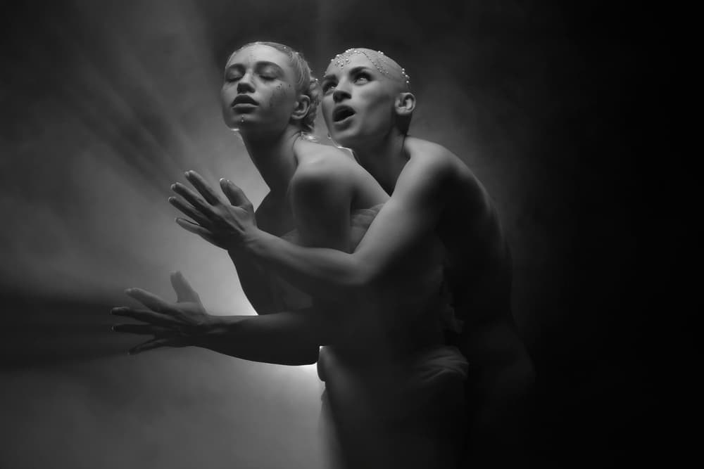 Spiritual Figures in Light by Alexandra Fira — canvas wall art