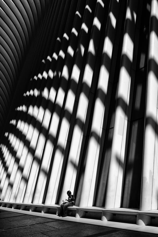 Architectural Shadows Reading by Carlos Costa — canvas wall art