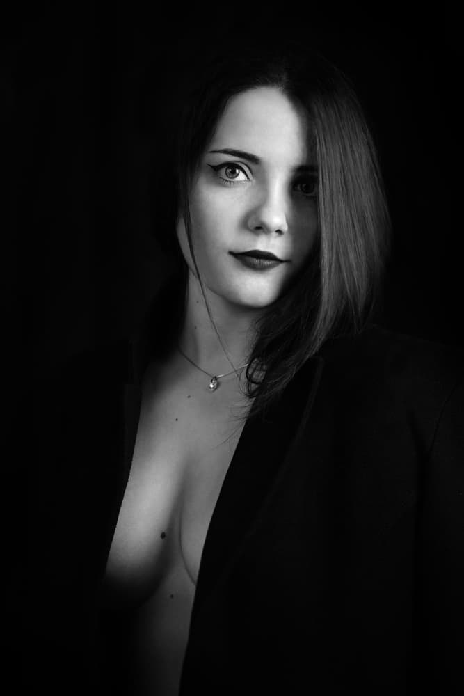 Elegant Woman's Sensual Gaze by Bobby Kostadinov — canvas wall art