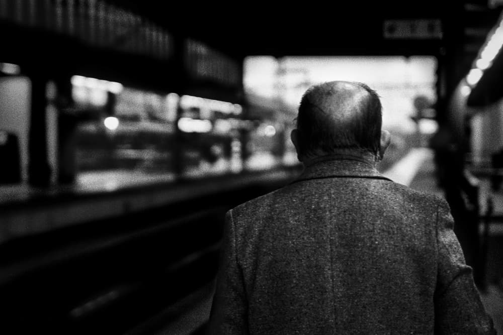 Man on Subway Platform by Paulo Abrantes — canvas wall art