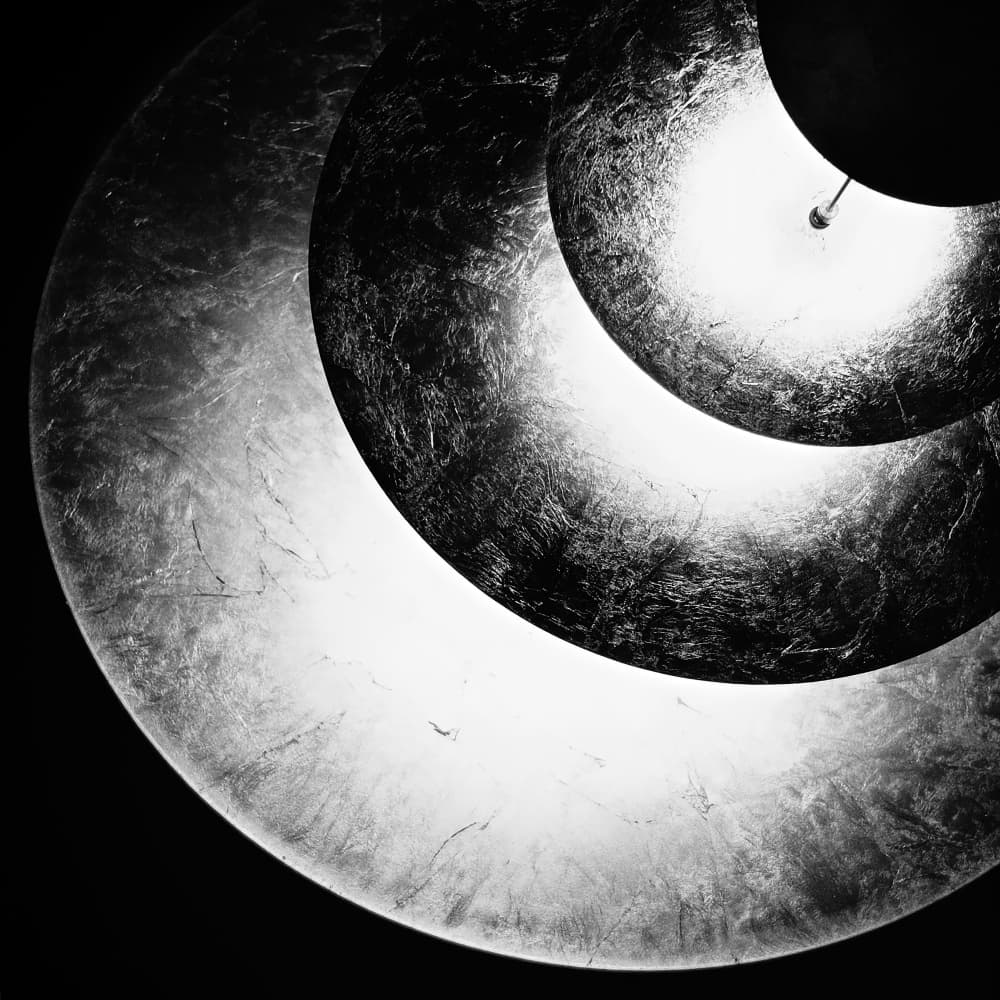 Luminous Metallic Rings by Elena Raceala — canvas wall art