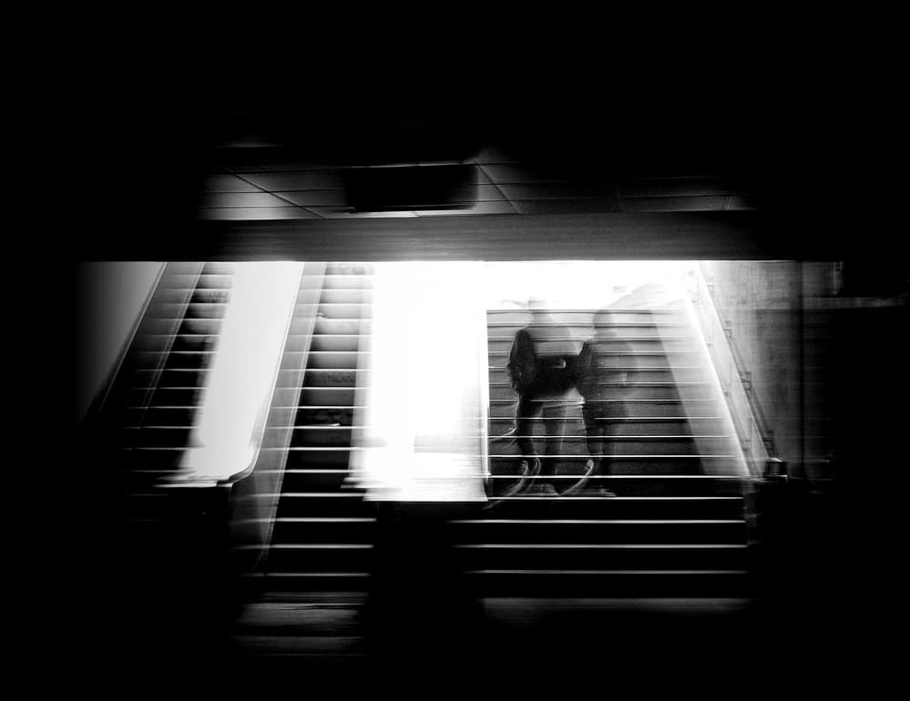 Shadowy Stairwell Figures by Mirela Momanu — canvas wall art