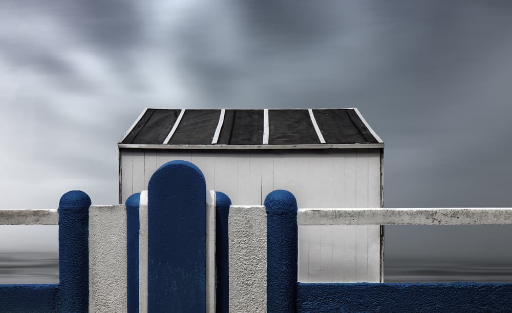 Blue And White Coastal Hut by Gilbert Claes — canvas wall art