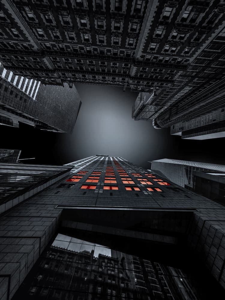 Towering City Orange Glow by Ibrahim Nabeel — canvas wall art
