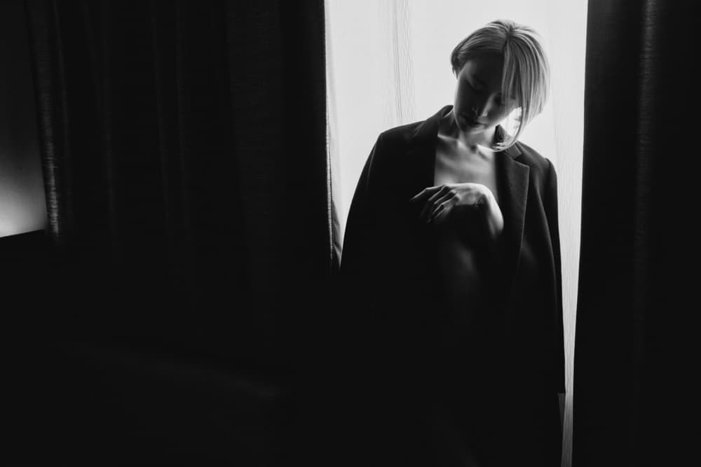 Pensive Woman In Light by Takaaki Ishikura — canvas wall art
