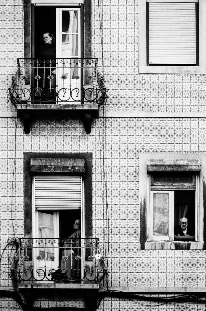 City Balcony Watchers by Milena Seita — canvas wall art